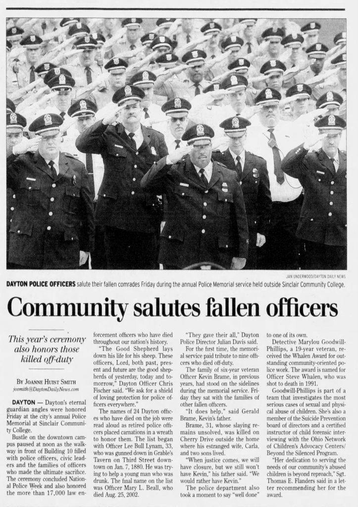 Image of article titled "Community solutes fallen officers" from Dayton Daily News